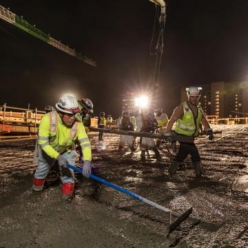 People working on a concrete pour 